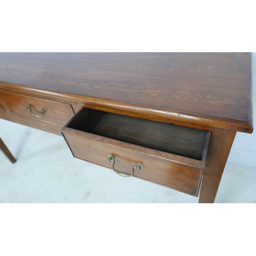 559 - A new oak sideboard server, three frieze drawers with brass swan neck handles, raised on square sect... 