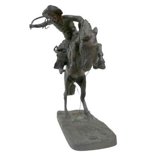 125 - A Franklin Mint bronze resin sculpture, 'Broncho Buster', after Frederic Remington, 16 by 5 by 17cm ... 