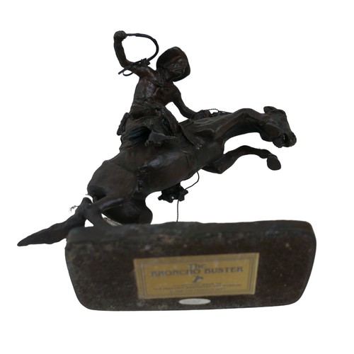 125 - A Franklin Mint bronze resin sculpture, 'Broncho Buster', after Frederic Remington, 16 by 5 by 17cm ... 