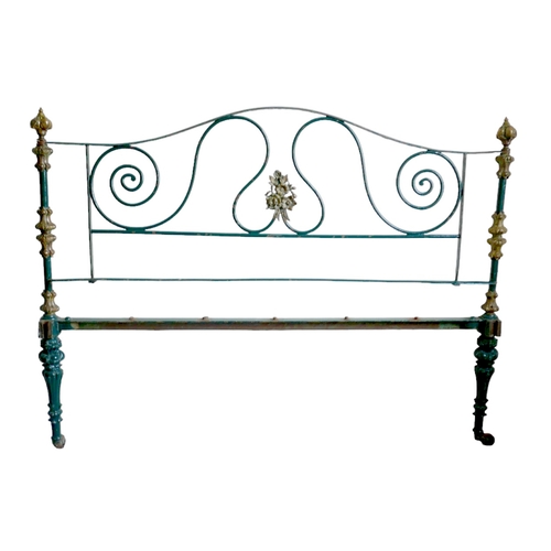 514 - A French 19th century metal double bed frame, painted green, with brass floral and scrolling decorat... 