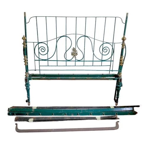 514 - A French 19th century metal double bed frame, painted green, with brass floral and scrolling decorat... 