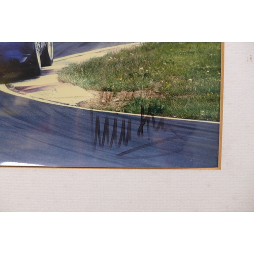 357 - Will Hoy, British Touring Car Champion, signed photograph, 17 by 25cm, framed, 29 by 36cm.