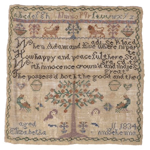 303 - A 19th century needlework sampler, cross stitch threads on linen, depicting alphabets, verse, and an... 