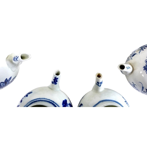 85 - A group of four 18th century Worcester teapots, with blue and white hand painted floral decoration, ... 