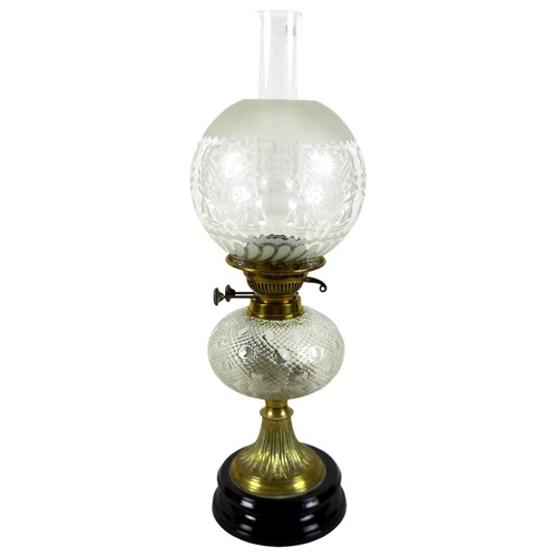 350 - A Victorian paraffin lamp, with etched glass globe shade and clear glass chimney, 17 by 58cm high.