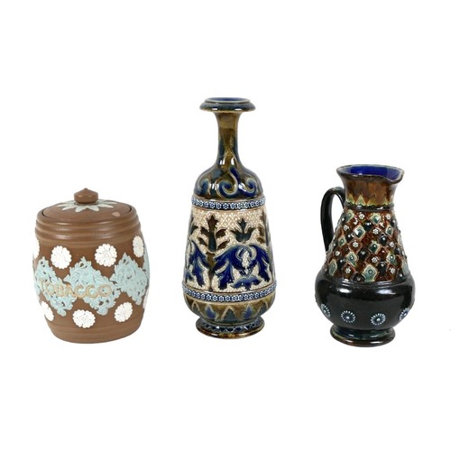 33 - Three Royal Doulton stonewares, comprising a tobacco jar, 13cm high, a jug, 15.5cm high, and vase, 2... 