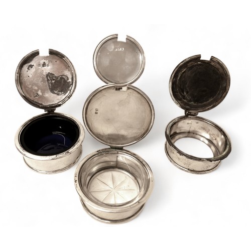 71 - A group of four silver mustards, two with glass liners, each 10 by 7.5 by 4.5cm high, 18.2toz. (4)