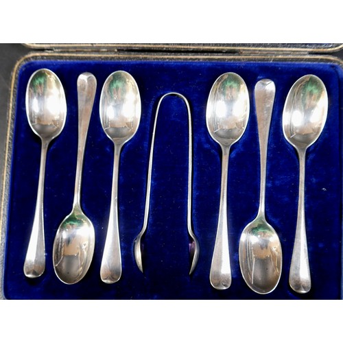 47 - Two boxed sets of six silver tea spoons, one with nips and a boxed set of six silver handled knives.... 