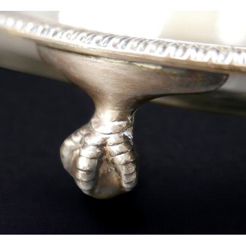 5 - An Elizabeth II silver tray, with scalloped and cast bead edge, raised on three claw and ball feet, ... 