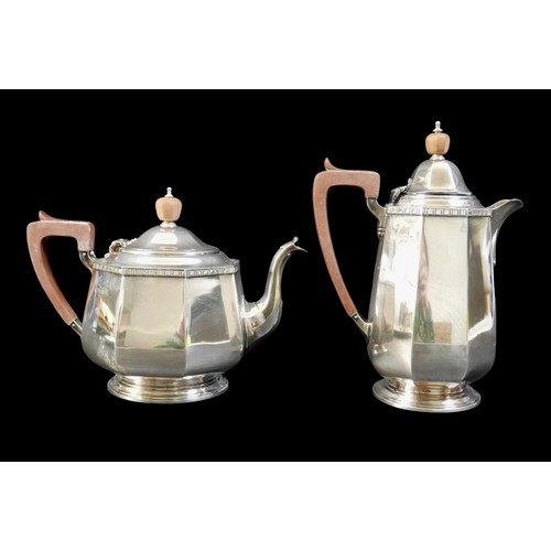 2 - A George V silver four piece tea service, each of eight sided bellied form with decorative border to... 