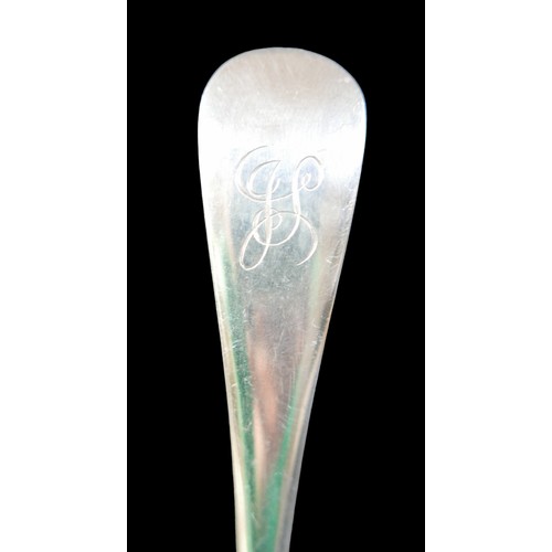 64 - Four 19th century silver table spoons, two with initials 'JS' to finials, rubbed hallmarks, together... 