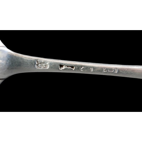 64 - Four 19th century silver table spoons, two with initials 'JS' to finials, rubbed hallmarks, together... 