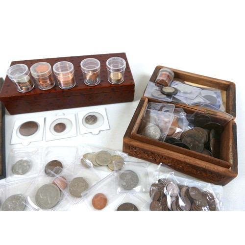 73 - A small collection of coins, including Britain's Royal Lineage, various copper, brass and some cupro... 