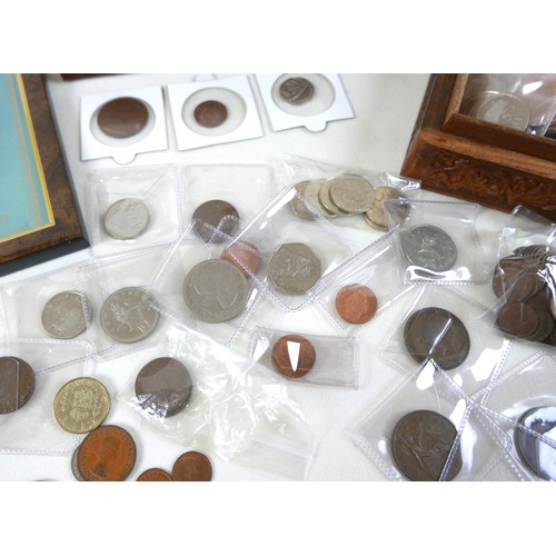 73 - A small collection of coins, including Britain's Royal Lineage, various copper, brass and some cupro... 