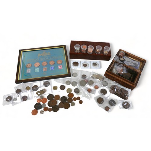 73 - A small collection of coins, including Britain's Royal Lineage, various copper, brass and some cupro... 