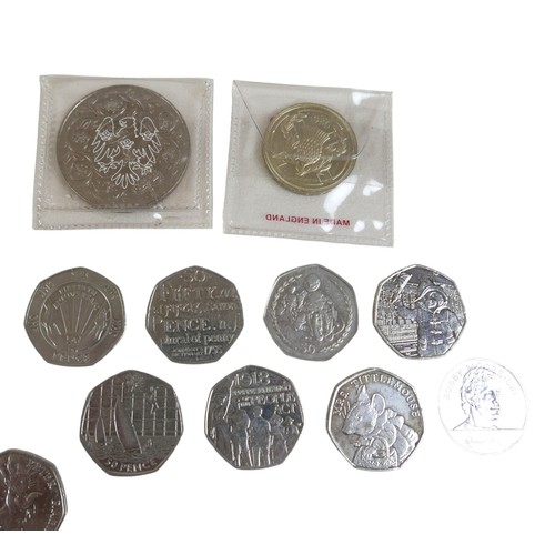 75 - A collection of commemorative coins, including forty seven 50 pence pieces and the United Kingdom Br... 