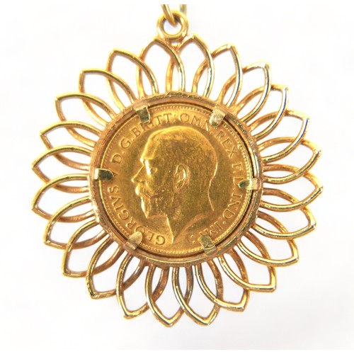 87 - A George V gold half sovereign, 1912, in a 9ct gold pendant mount, on a 9ct gold chain, 54cm long, 1... 