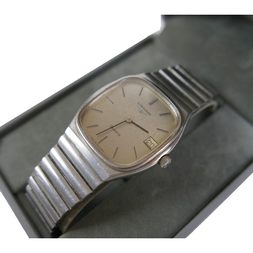 126 - A Longines Quartz stainless steel gentleman's bracelet wristwatch with date, 30mm case numbered 1881... 