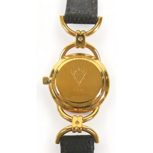 128 - Two ladies wristwatches, comprising a gold cased Vulcan Grand Prix watch, part Arabic dial intersper... 