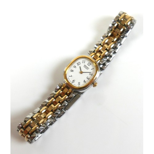 122 - A Seiko quartz movement lady's wristwatch, model 2Y00-5D50 RO, on bi-coloured metal bracelet, oval f... 