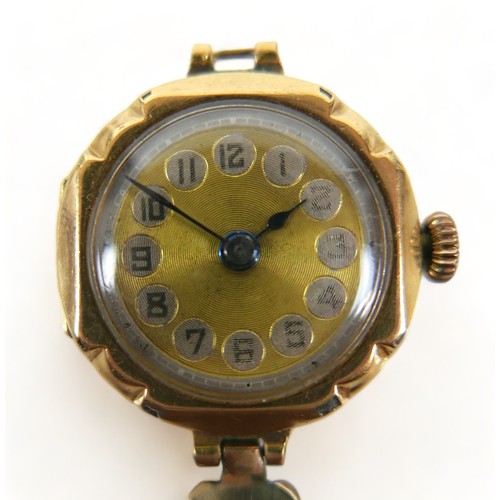 133 - An 18ct gold cased lady's wristwatch, with Arabic dial, 15 jewel Swiss movement, monogram 'MB' to ba... 