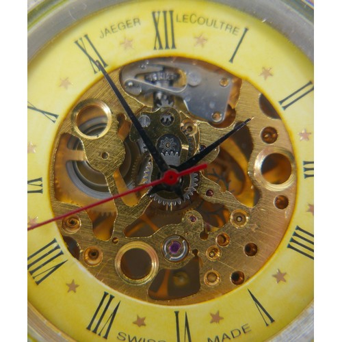 108 - A Jaeger LeCoultre open-faced skeleton pocket watch, with gilt metal case, Roman numeral dial.