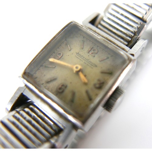 136 - A vintage Jaeger LeCoultre lady's wristwatch, with square steel case, square 3.6.9.12 Arabic dial, i... 