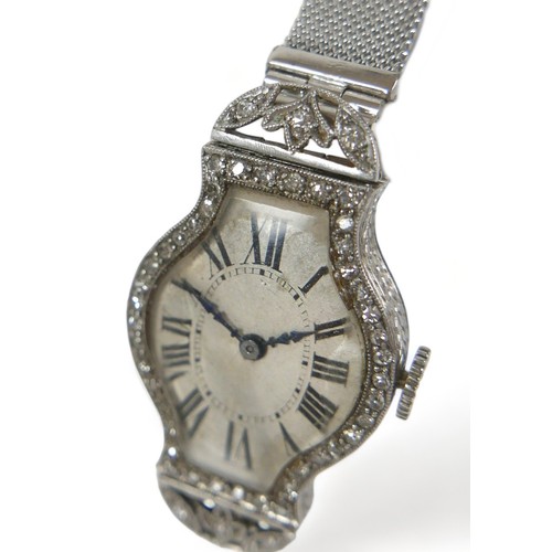 137 - An Art Deco diamond and platinum lady's cocktail watch, on a later 9ct white gold mesh strap, manual... 