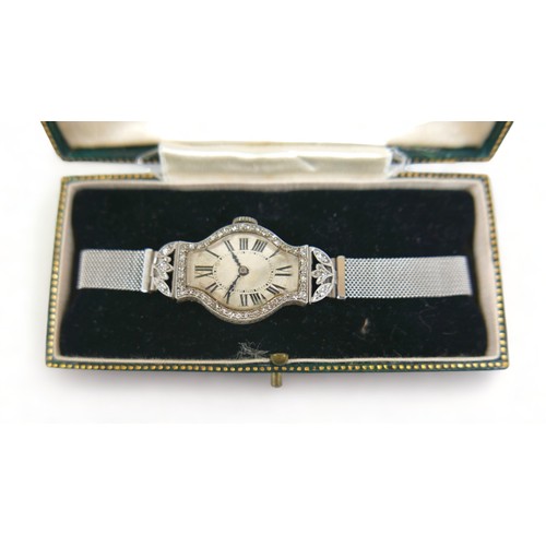 137 - An Art Deco diamond and platinum lady's cocktail watch, on a later 9ct white gold mesh strap, manual... 