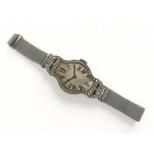 137 - An Art Deco diamond and platinum lady's cocktail watch, on a later 9ct white gold mesh strap, manual... 