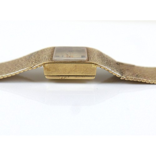 138 - A vintage Gerrards 9ct gold lady's wristwatch, square gold dial, black and gold batons and hands, se... 