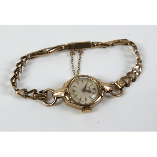 125 - A 9ct gold lady's Roamer 17 Jewels cocktail watch, 9ct gold case and bracelet, part Arabic dial with... 