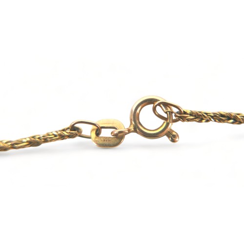 286 - A 9ct tri colour gold necklet 41cm long and a 9ct yellow gold 50cm chain with a gilt metal pearl pen... 