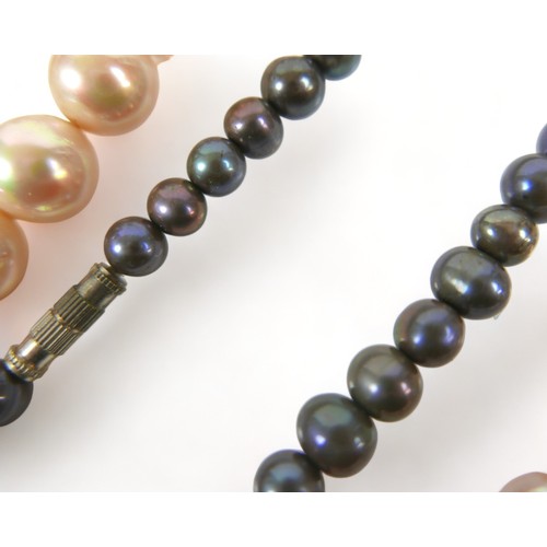 164 - A pearl necklace with a 9ct yellow gold clasp 44cm long and two other necklaces.