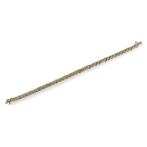 244 - A 14ct yellow gold diamond bracelet, 18cm long 4mm wide, 9.80 grams.