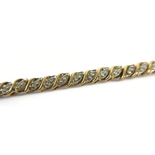 244 - A 14ct yellow gold diamond bracelet, 18cm long 4mm wide, 9.80 grams.