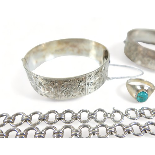 209 - A silver charm bracelet, two silver bangles and other assorted silver and white metal jewellery tota... 