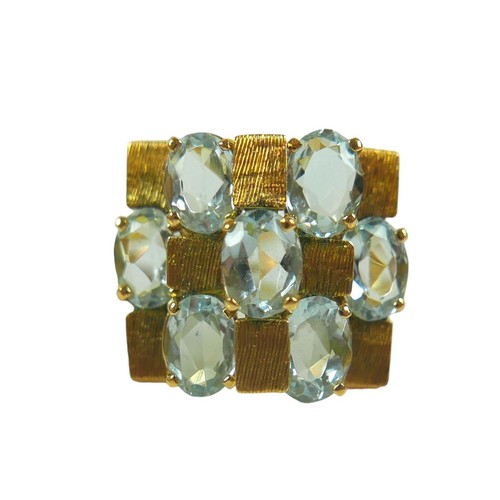 338 - A contemporary 18ct yellow aquamarine gold designer ring and stud earring set, ring size N/O, head s... 