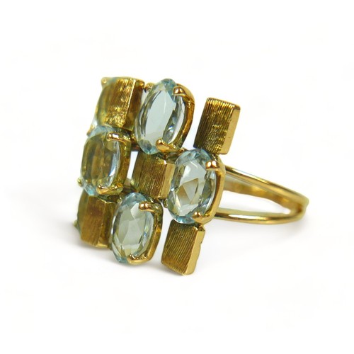 338 - A contemporary 18ct yellow aquamarine gold designer ring and stud earring set, ring size N/O, head s... 