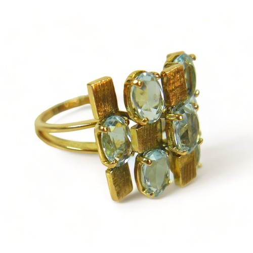 338 - A contemporary 18ct yellow aquamarine gold designer ring and stud earring set, ring size N/O, head s... 