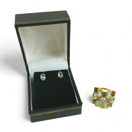 338 - A contemporary 18ct yellow aquamarine gold designer ring and stud earring set, ring size N/O, head s... 