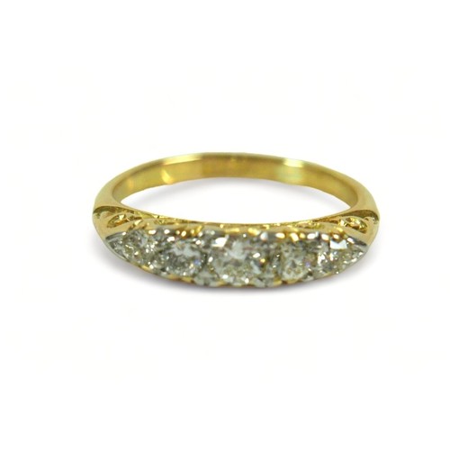 309 - An Edwardian 18ct yellow gold five stone diamond ring, size K, weight 3 grams.