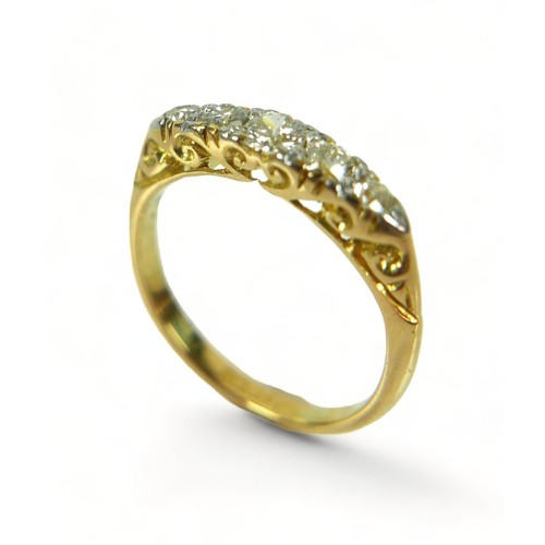 309 - An Edwardian 18ct yellow gold five stone diamond ring, size K, weight 3 grams.