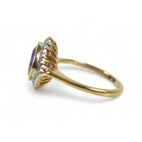 313 - A 9ct yellow gold amethyst and diamond ring, size M/N, head 14mm by 14mm, weight 3.7g.