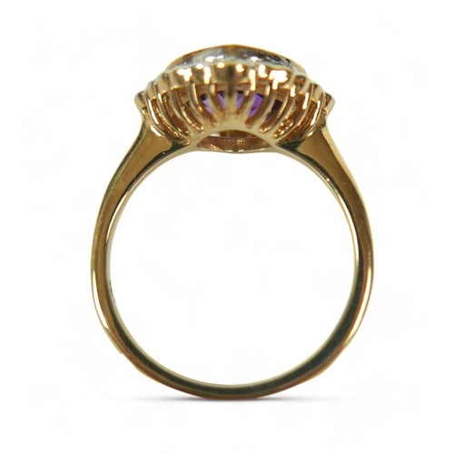 313 - A 9ct yellow gold amethyst and diamond ring, size M/N, head 14mm by 14mm, weight 3.7g.