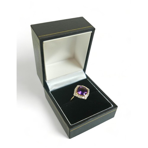 313 - A 9ct yellow gold amethyst and diamond ring, size M/N, head 14mm by 14mm, weight 3.7g.