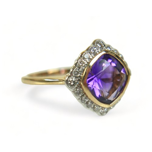 313 - A 9ct yellow gold amethyst and diamond ring, size M/N, head 14mm by 14mm, weight 3.7g.