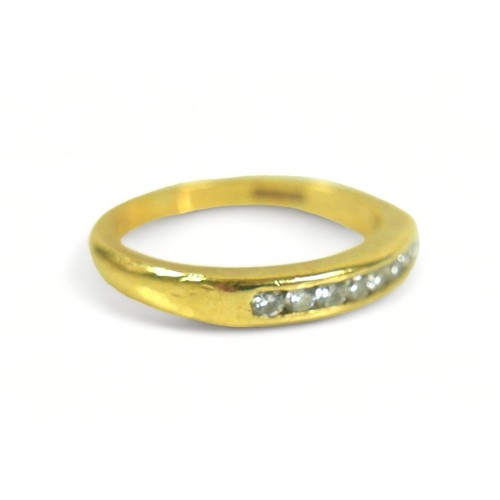 237 - An 18ct yellow gold eight stone diamond ring, size L/M, 3.8 grams.