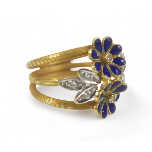 317 - A diamond and enamel flower head ring, with eight small diamonds, the band stamped '750', size M, 7.... 