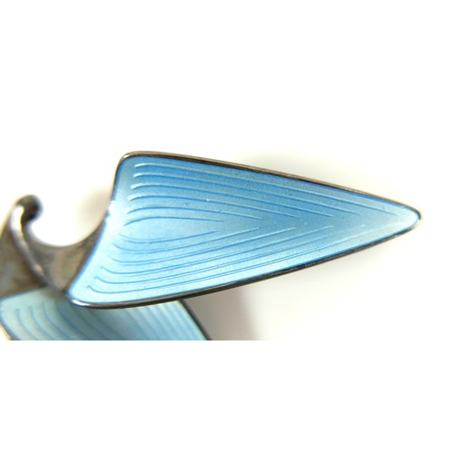 166 - A vintage Norwegian sterling silver and pale blue basse-taille enamel brooch, by Einar Modahl, circa... 